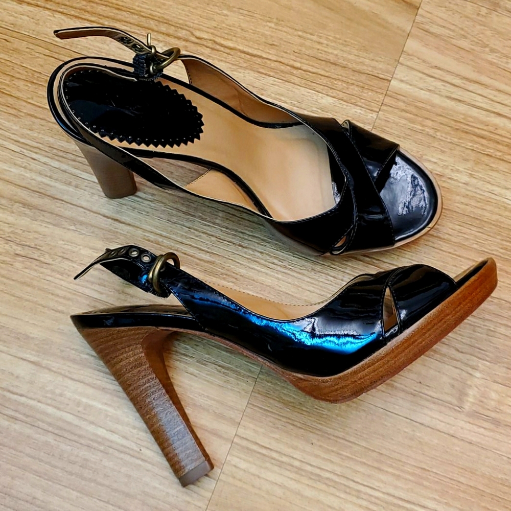 4" Black patent leather peekaboo heels.